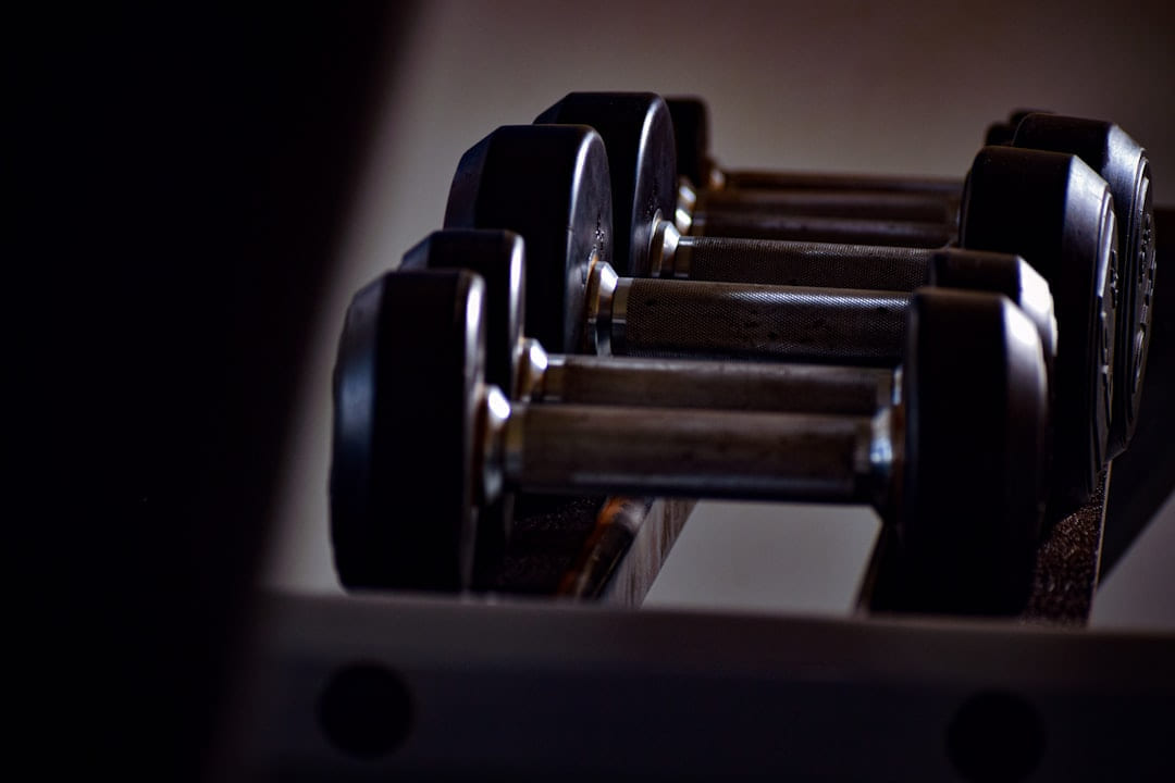 a close up of a row of dumbbells on First Rep Forward