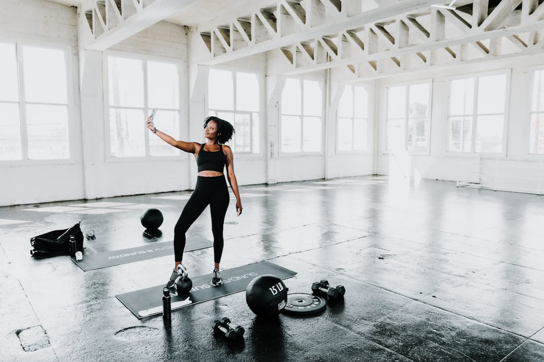 a woman is doing exercises in a gym on First Rep Forward