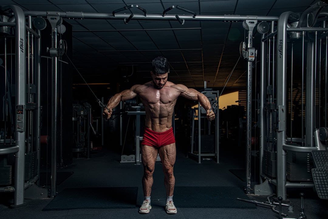 a man lifting weights in a gym on First Rep Forward