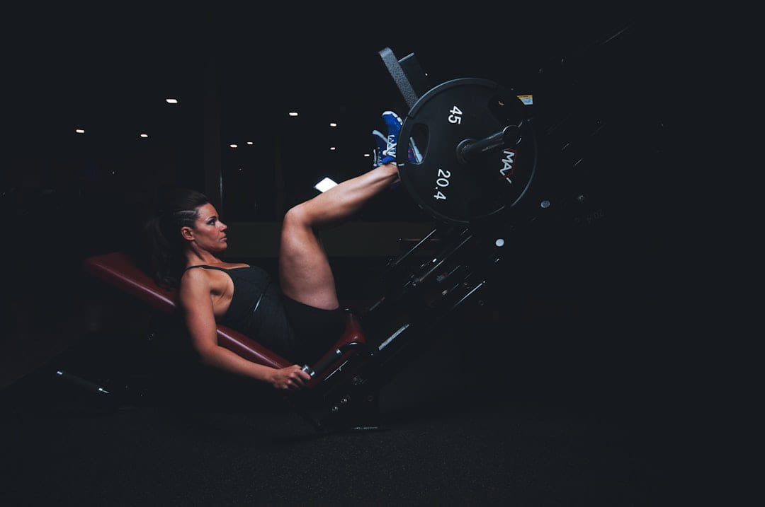woman on gym equipment on First Rep Forward