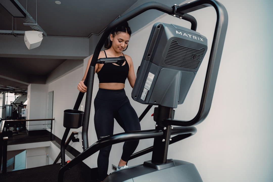 A woman on a treadmill in a gym on First Rep Forward